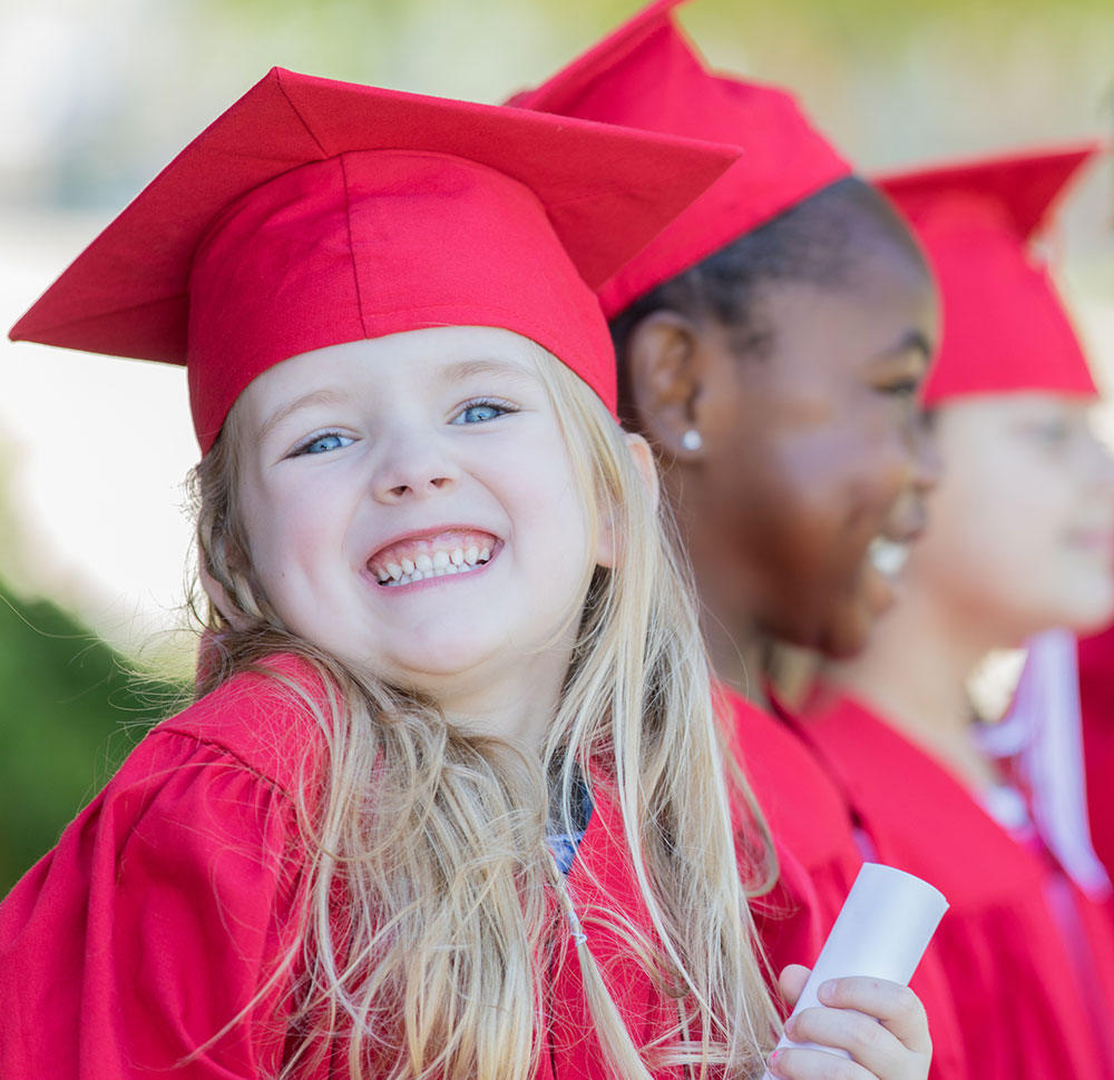 Kindergarten-girls-smile-graduationjpg Kindergarten-girls-smile-graduationjpg